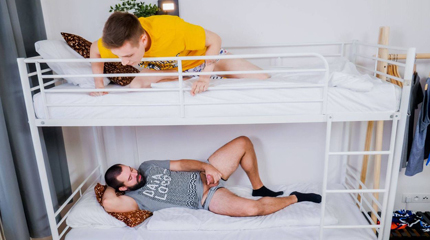 At the hotel on a bunk bed
